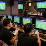 Exciting Keonhacai sports betting scene with fans enjoying live matches and odds updates.